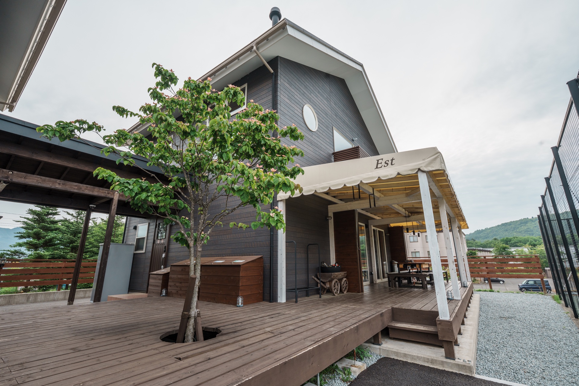 Wood deck next to the courts